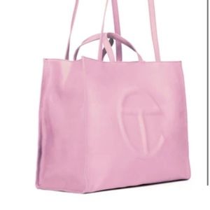 Pink medium size Telfar bag, never worn.